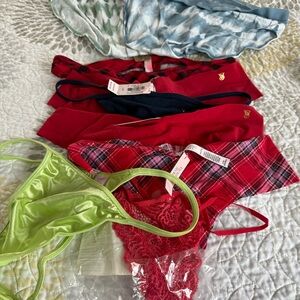 Victoria's Secret Mixed Bundle - 9 large pairs.2 briefs and 7 thongs.Great deal!